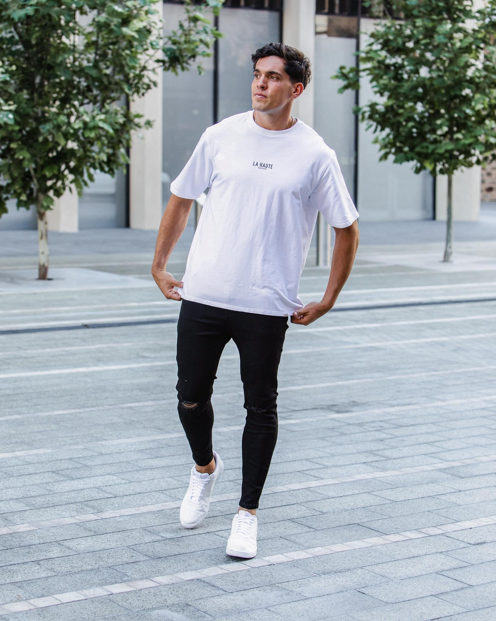 Jean skinny noir déchiré au genou - coupe slim