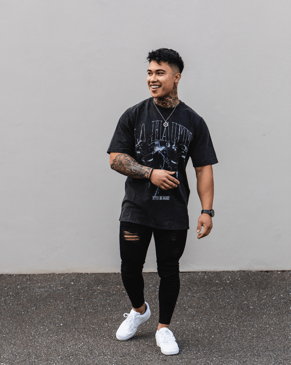 Jeans skinny noirs déchirés - denim usé et audacieux avec coupe slim