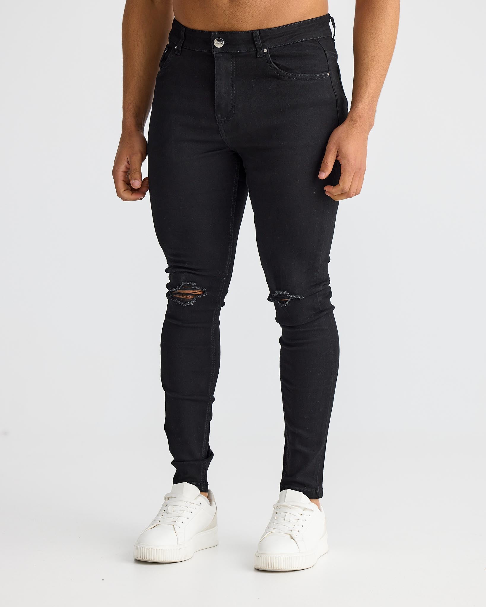 Jean skinny noir déchiré au genou - coupe slim