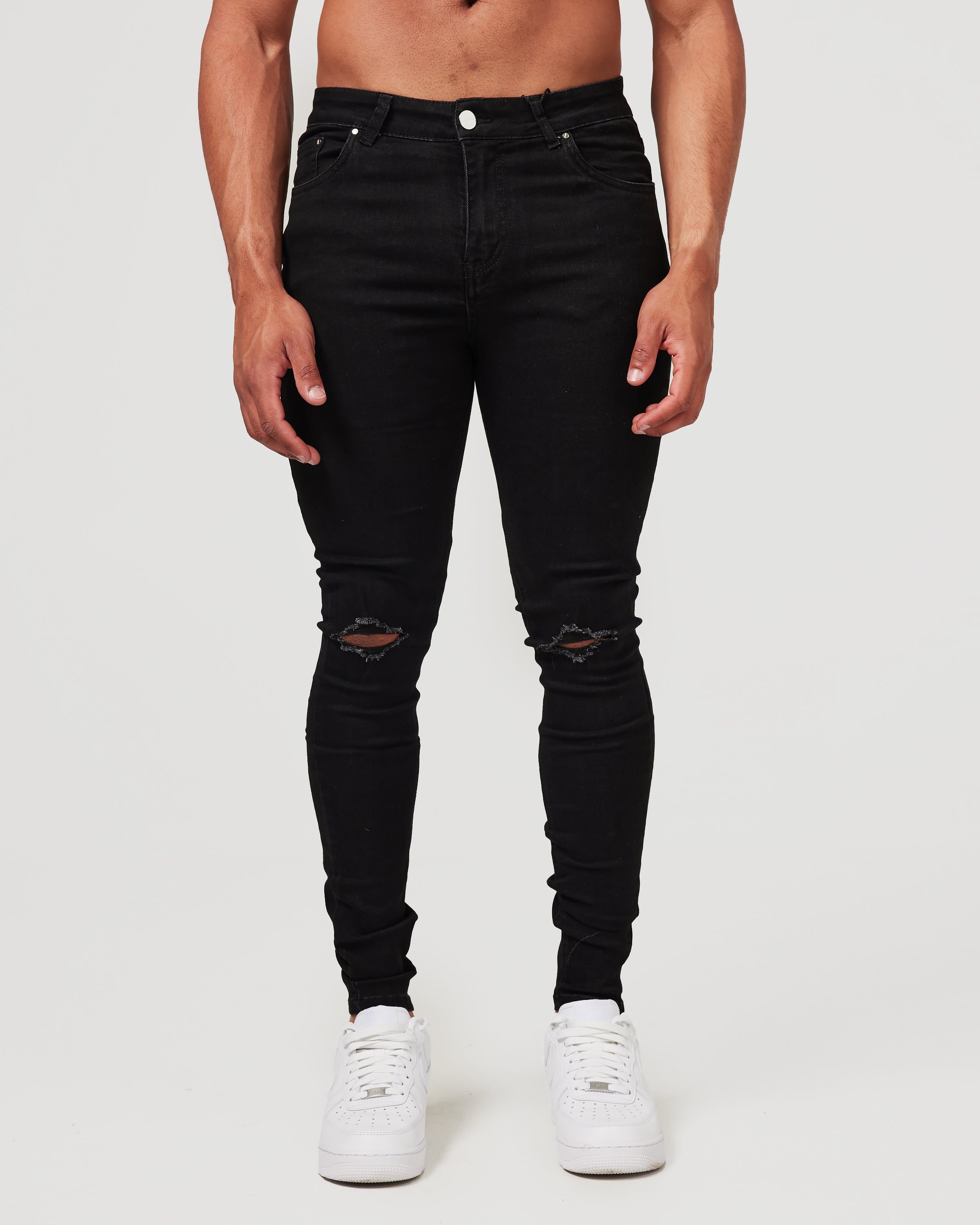 Jean skinny noir déchiré au genou - coupe slim