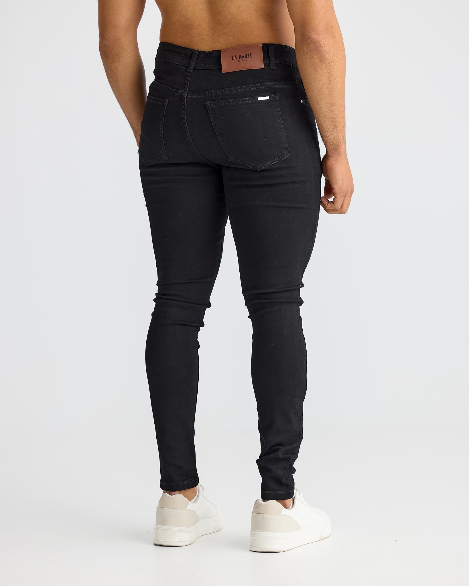 Jean skinny noir déchiré au genou - coupe slim